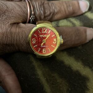 Gomia Quartz Gold Tone Finger Stretch Red Glitter Ring Watch